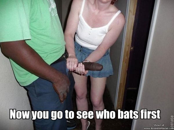 A woman playfully holding a large object with a man standing beside her, both smiling, with text overlay saying, 'Now you go to see who bats first.'